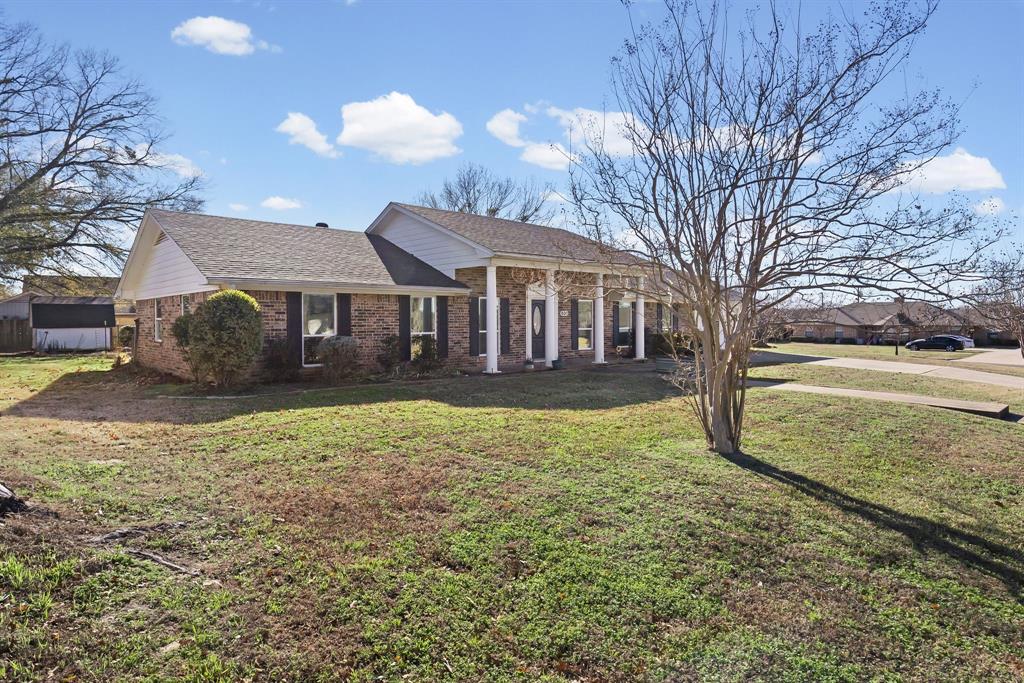 601 Rasure Circle Sulphur Springs, TX 75482 - Photo 6 of 40 a view of a house with a yard