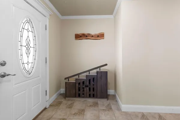 a view of a hallway with entryway