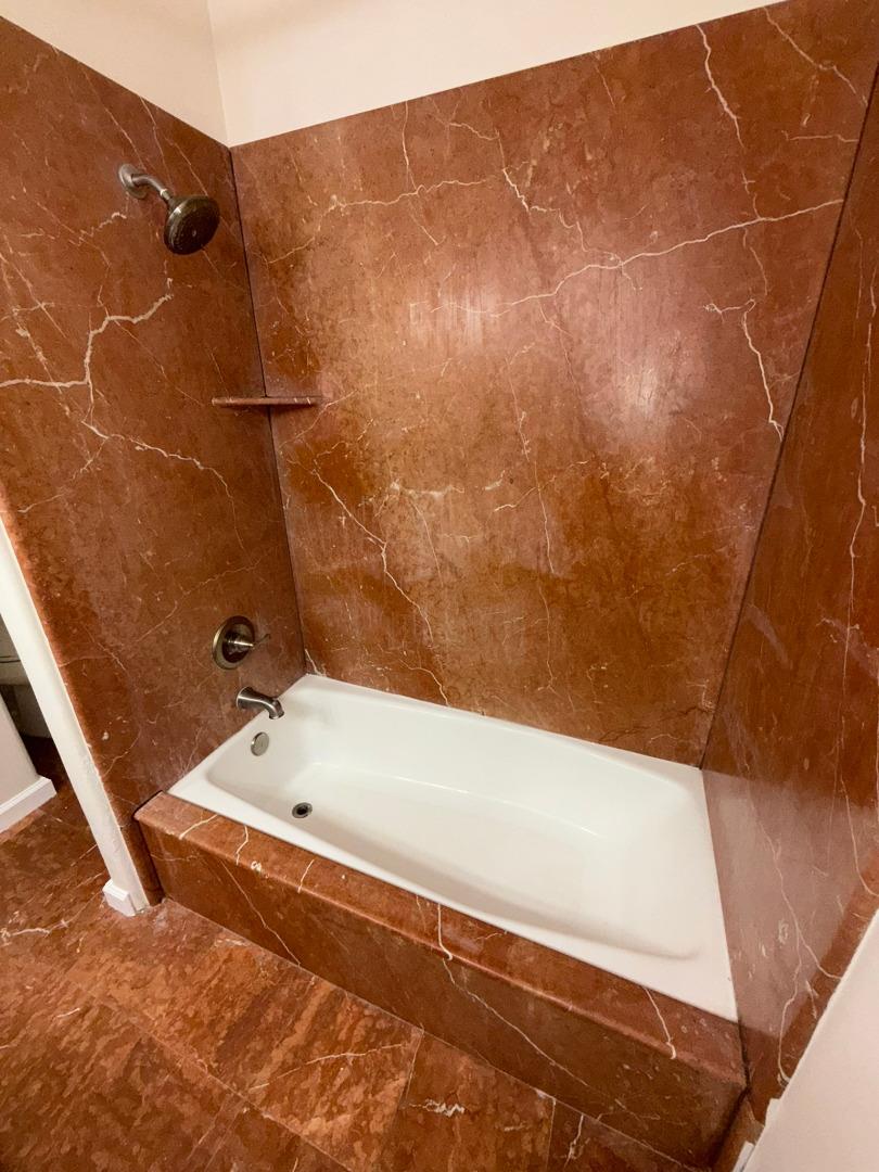 11585 McCarthy Road Carmel Valley, CA 93924 - Photo 32 of 52 a bathroom with a bathtub