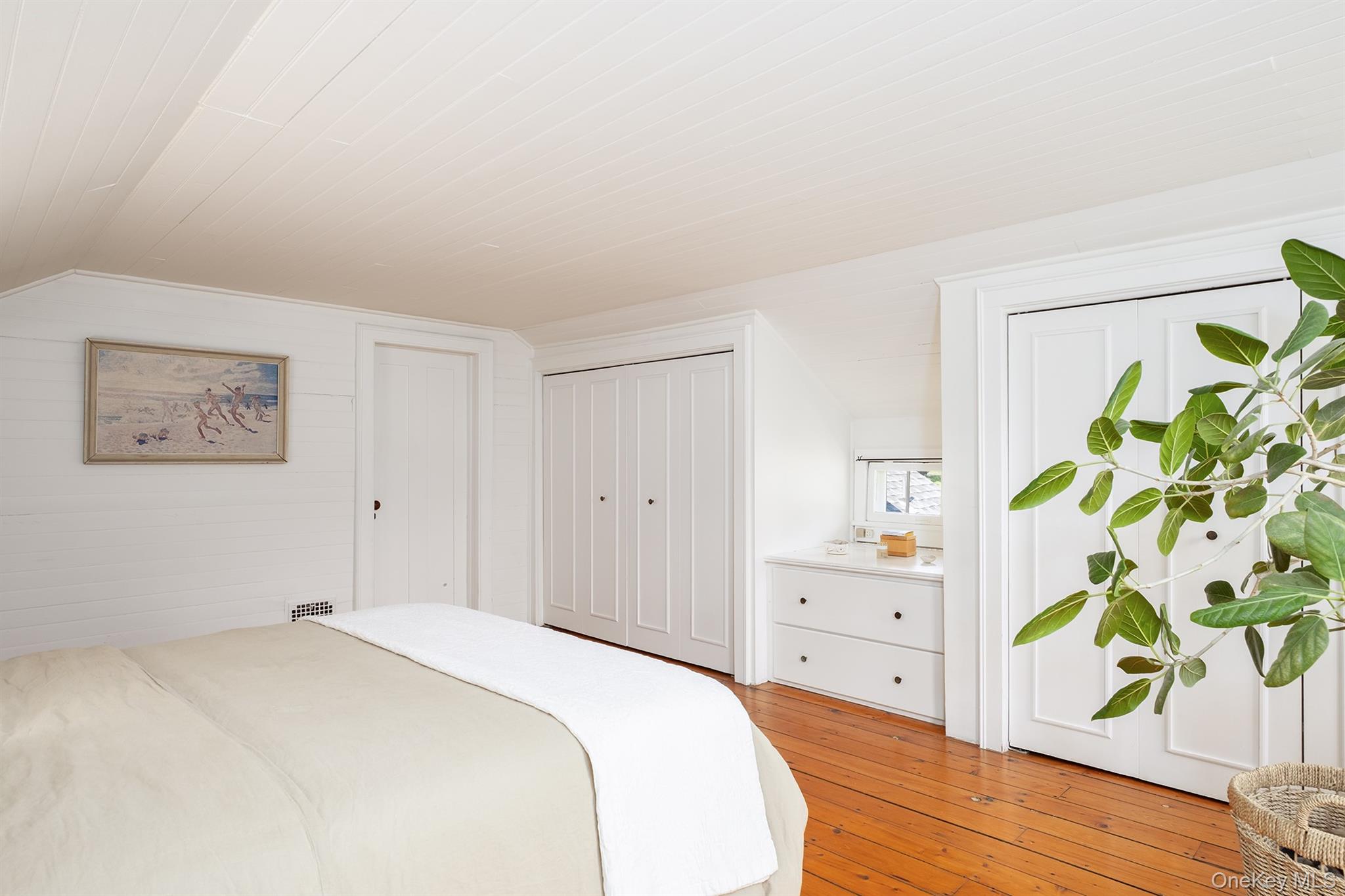 77 Upper Hook Road Rhinebeck, NY 12572 - Photo 22 of 48 a bedroom with a bed and a wooden floor