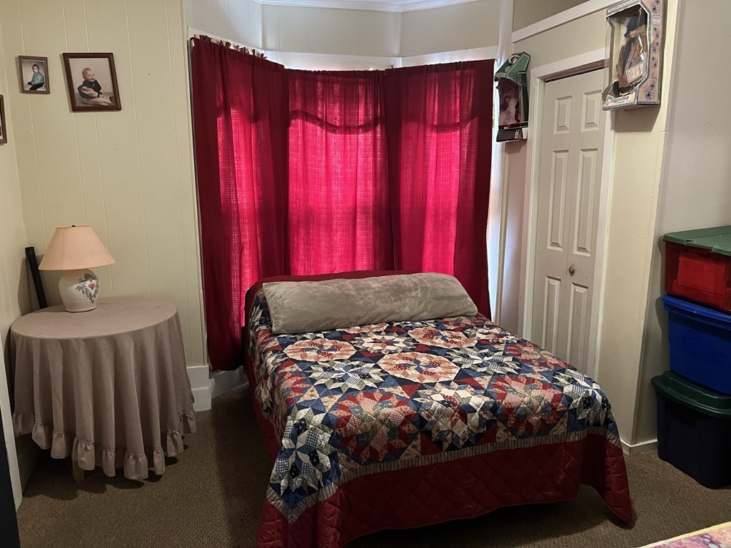 2-4 Prospect Street Haverhill, MA 01832 - Photo 12 of 42 a bedroom with a bed and a window