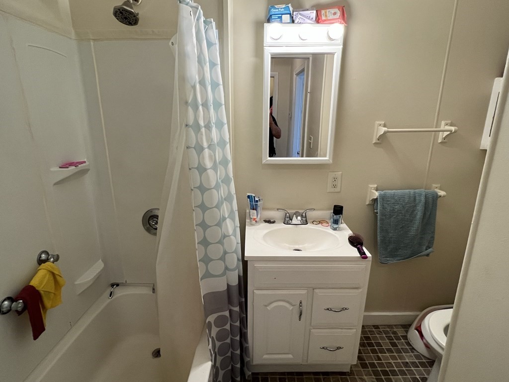 2-4 Prospect Street Haverhill, MA 01832 - Photo 17 of 42 a bathroom with a sink toilet and shower