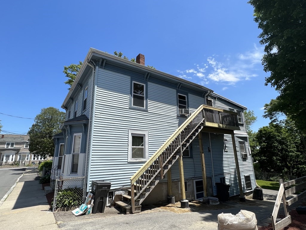 2-4 Prospect Street Haverhill, MA 01832 - Photo 2 of 42 a view of a house with a patio