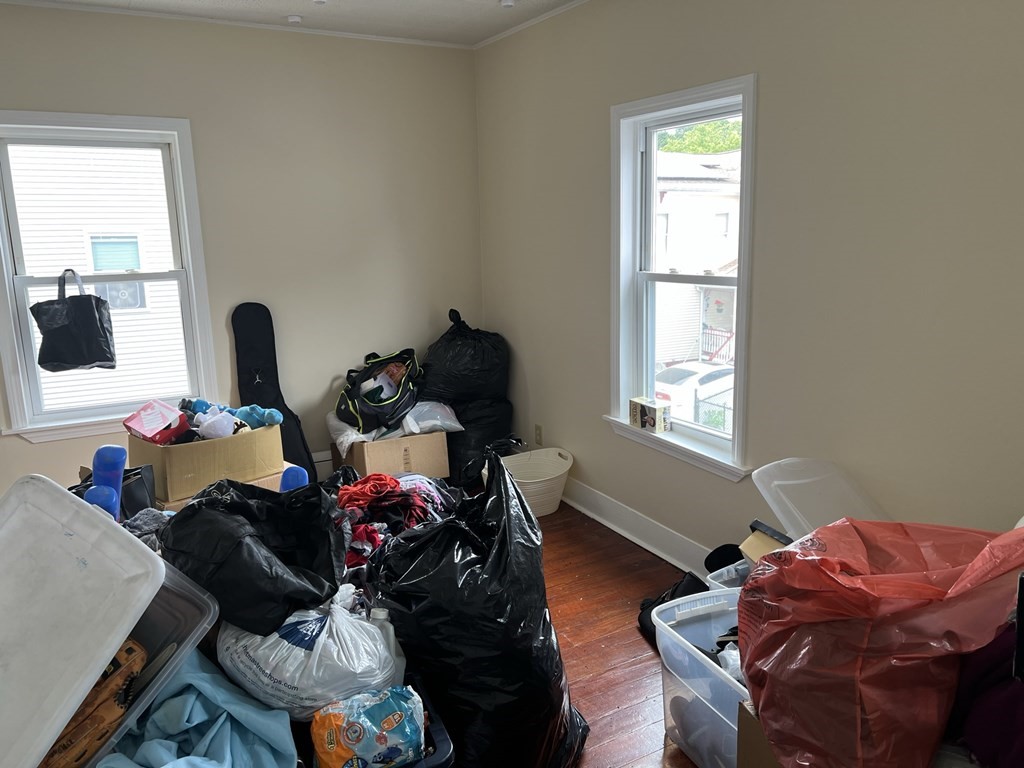 2-4 Prospect Street Haverhill, MA 01832 - Photo 28 of 42 a living room with furniture chess board and a window