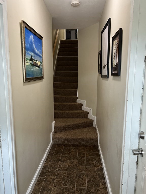 2-4 Prospect Street Haverhill, MA 01832 - Photo 9 of 42 a view of a hallway with stairs
