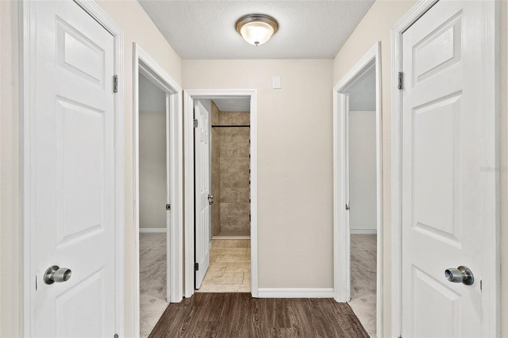 6601 North Elizabeth Street Tampa, FL 33604 - Photo 22 of 35 a view of a hallway with wooden floor