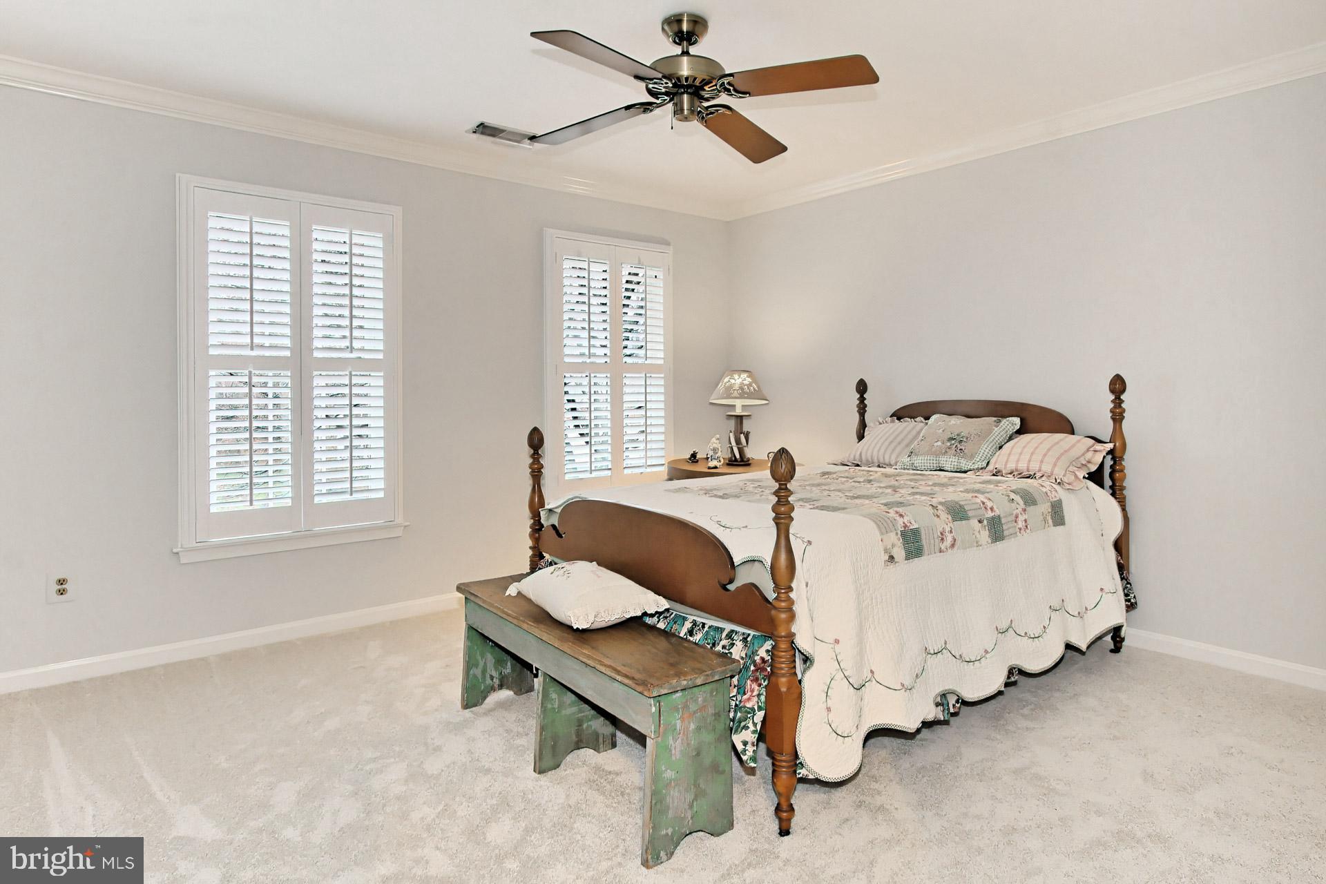 8126 Ridge Creek Way Springfield, VA 22153 - Photo 26 of 50 a bed room with a bed and a window