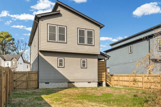 a view of backyard of house