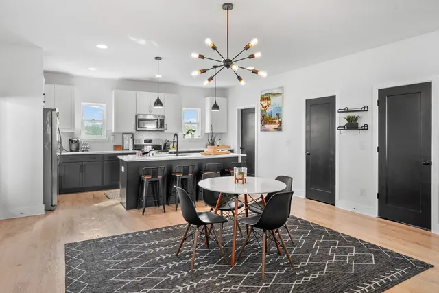 a view of a dining room with furniture