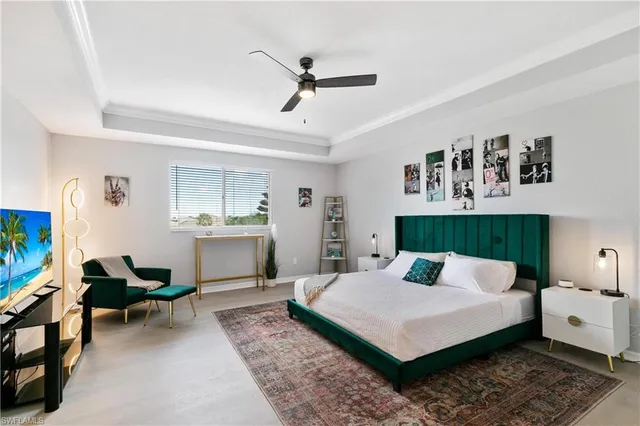 a bedroom with furniture and a window