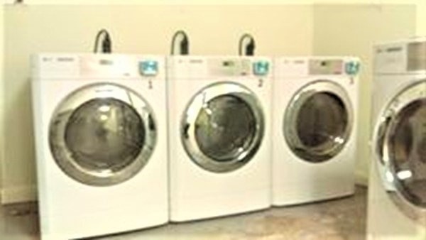 153 Strathmore Road, Unit 8 Boston, MA 02135 - Photo 13 of 14 a utility room with dryer and washer