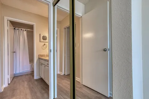 a view of a bathroom with a glass door