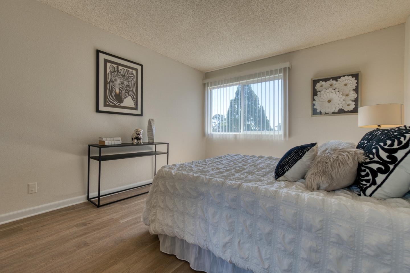 376 Imperial Way, Unit 315 Daly City, CA 94015 - Photo 16 of 29 a bedroom with a bed and a window