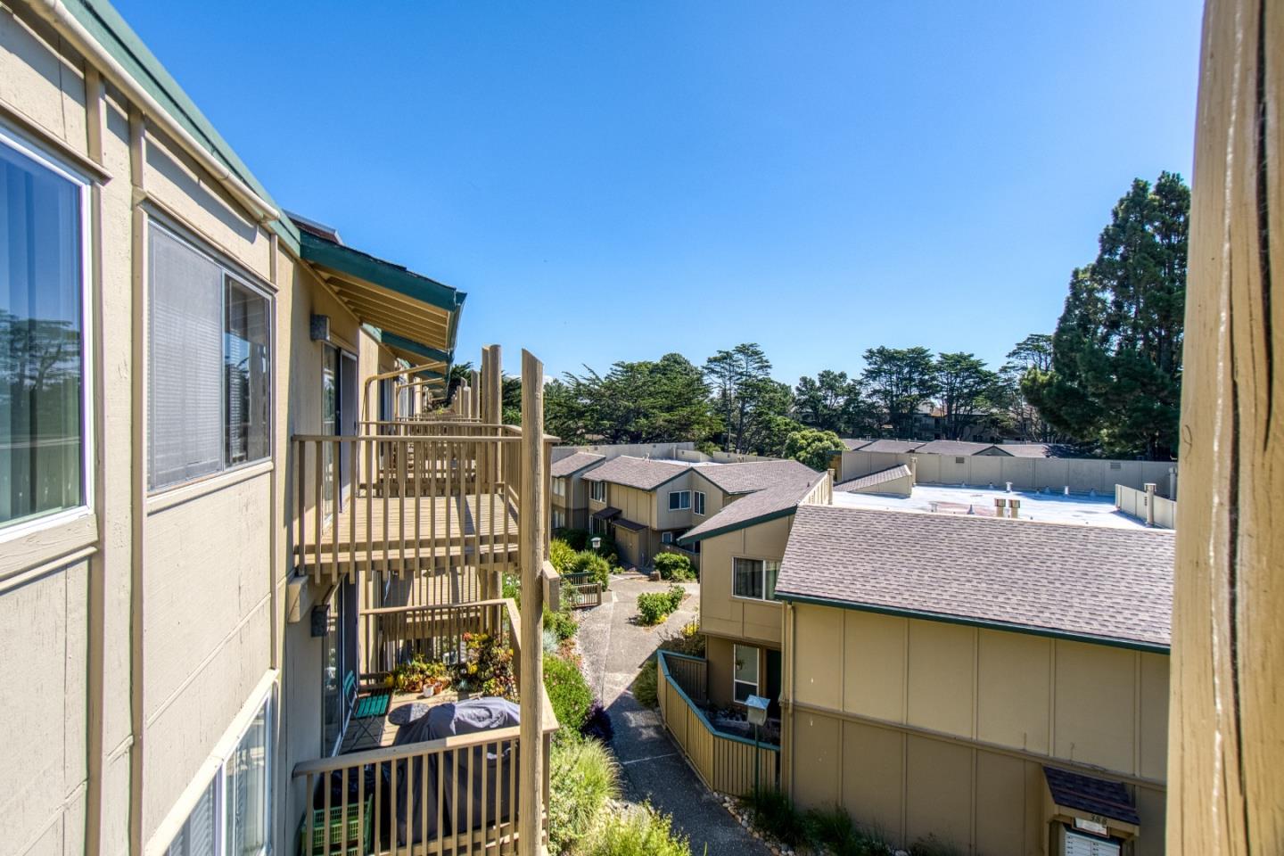 376 Imperial Way, Unit 315 Daly City, CA 94015 - Photo 21 of 29 a balcony of a house with wooden floor and outdoor space