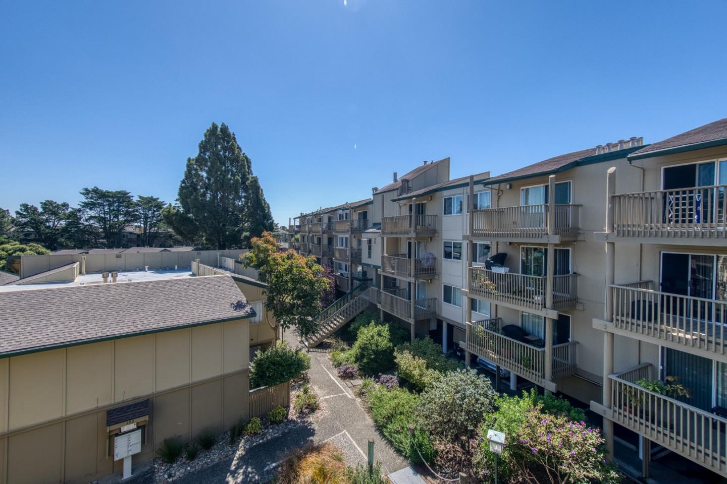 376 Imperial Way, Unit 315 Daly City, CA 94015 - Photo 22 of 29 a view of a patio with table and chairs and potted plants