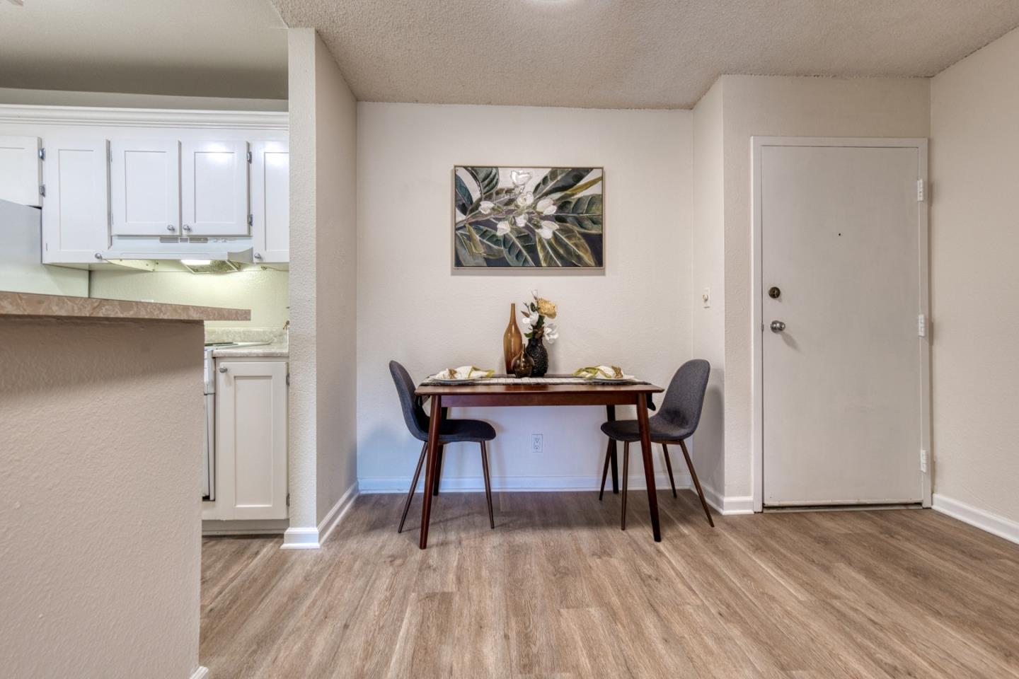 376 Imperial Way, Unit 315 Daly City, CA 94015 - Photo 6 of 29 a workspace with wooden floor