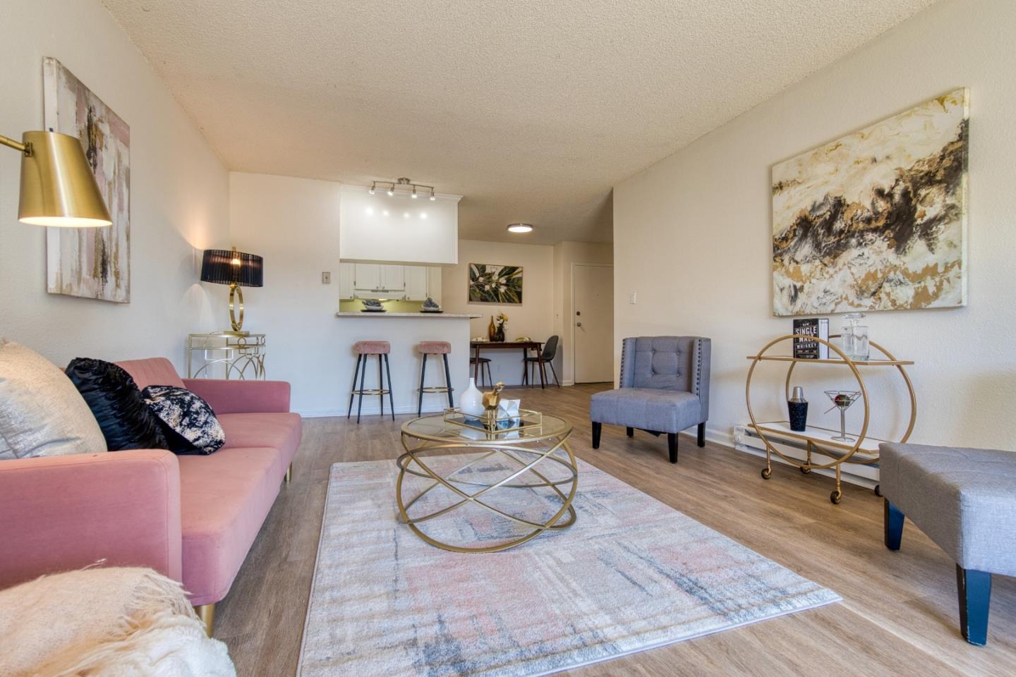 376 Imperial Way, Unit 315 Daly City, CA 94015 - Photo 8 of 29 a living room with furniture and wooden floor