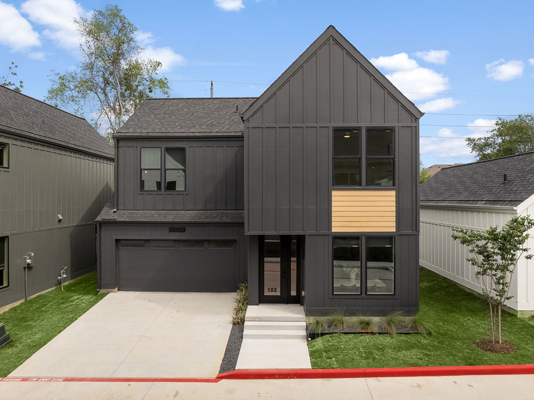 1941 Sawdust Road, Unit 120 The Woodlands, TX 77380 - Photo 1 of 38 a house view with a outdoor space