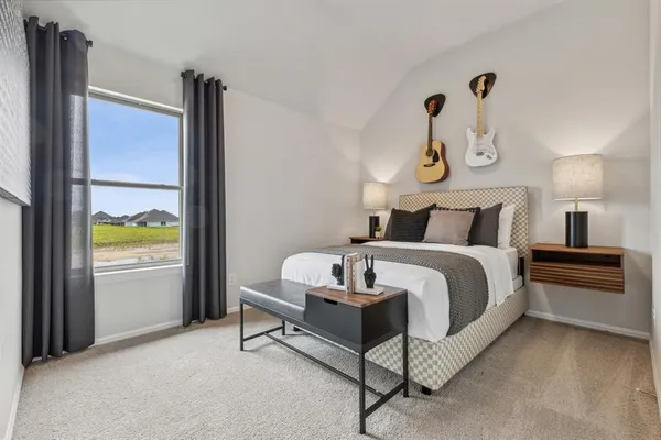 a bathroom with a sink a toilet a mirror and shower