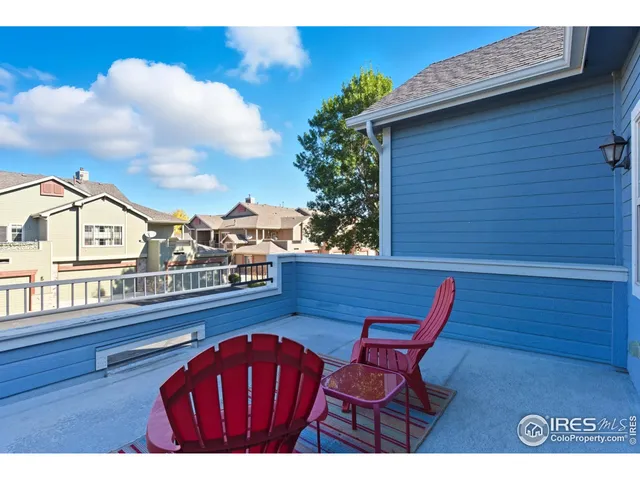 a view of sitting area in front of house