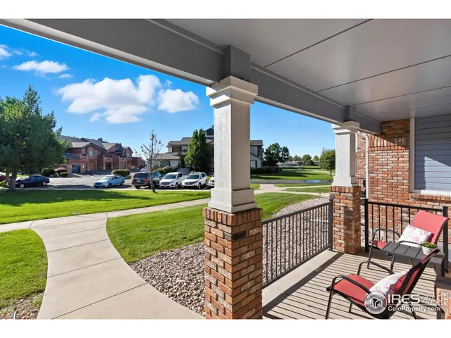 a view of a porch with a garden
