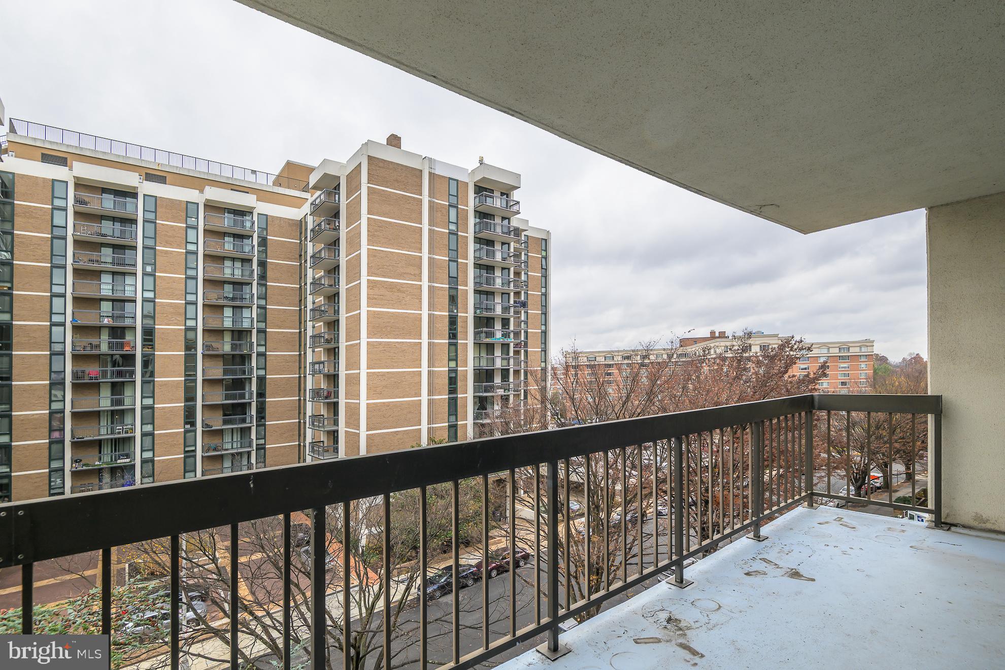 1016 South Wayne Street, Unit 604 Arlington, VA 22204 - Photo 21 of 42 a city view from a balcony