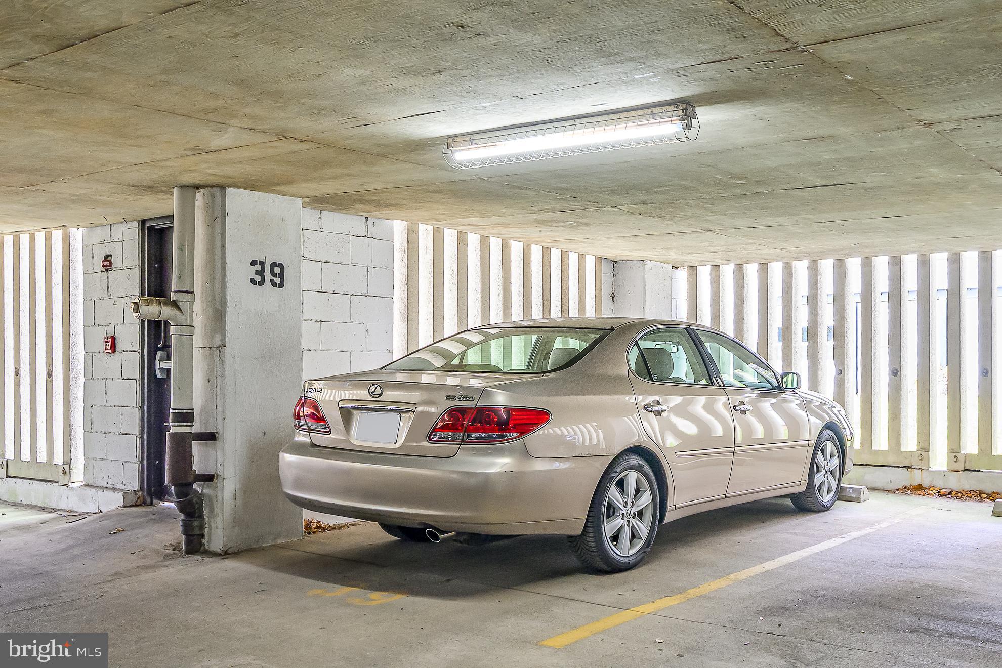 1016 South Wayne Street, Unit 604 Arlington, VA 22204 - Photo 40 of 42 a car parked in a garage