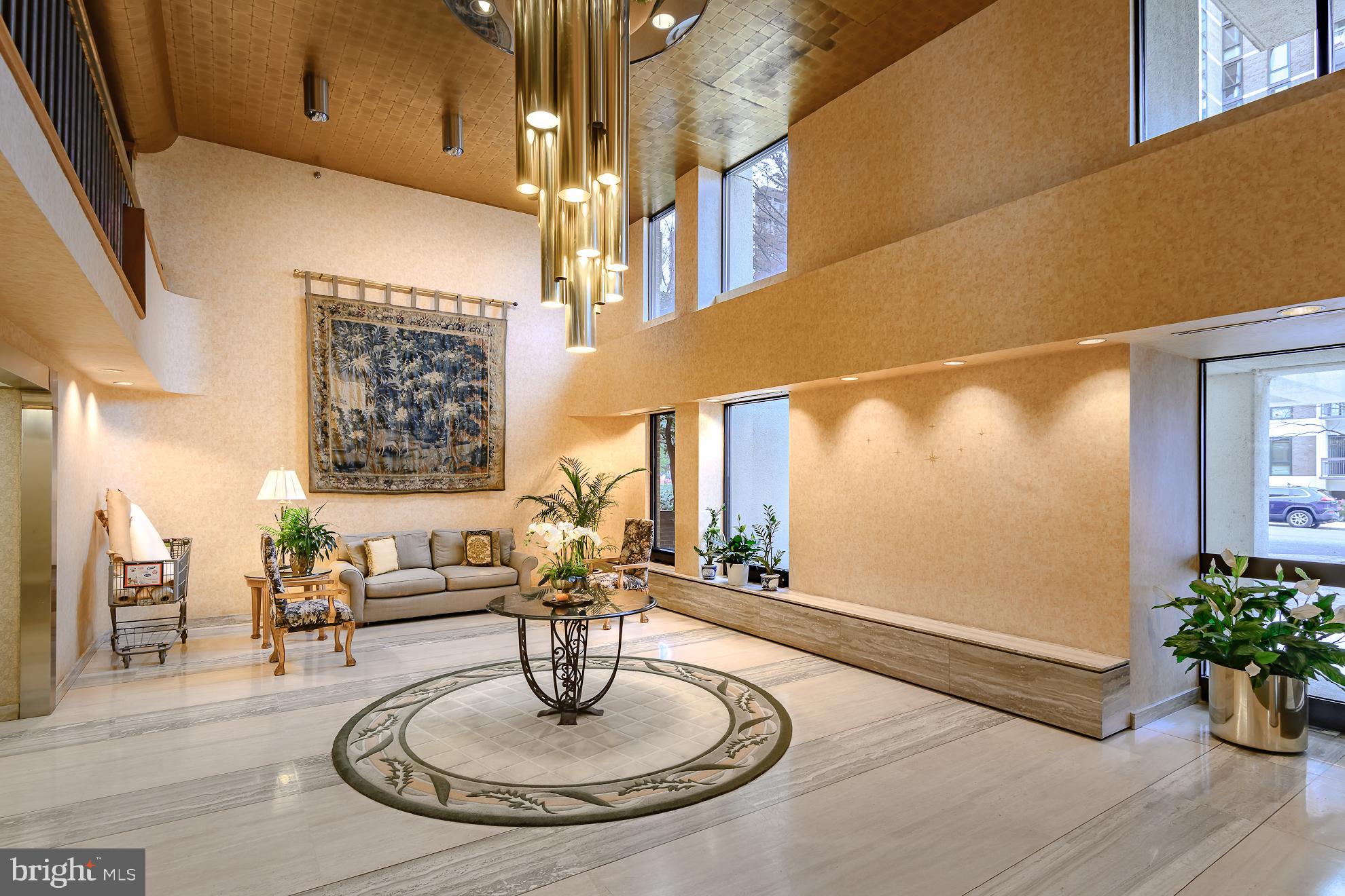 1016 South Wayne Street, Unit 604 Arlington, VA 22204 - Photo 41 of 42 a room with lots of potted plants