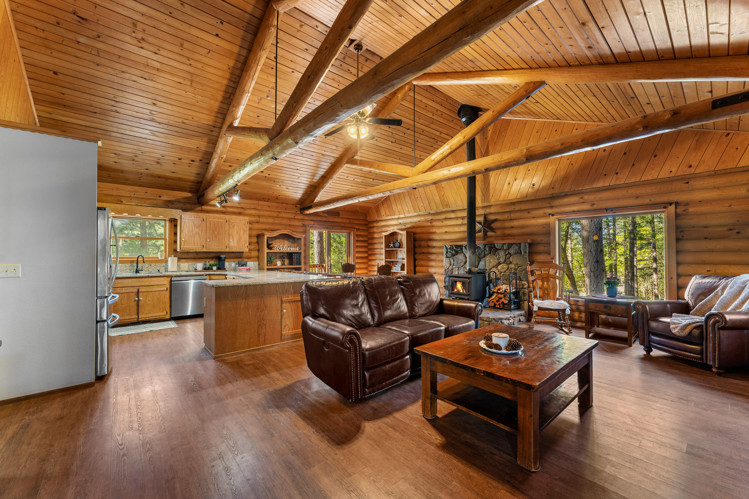 1201 Reeves Creek Road Selma, OR 97538 - Photo 5 of 38 a living room with lots of furniture and kitchen view