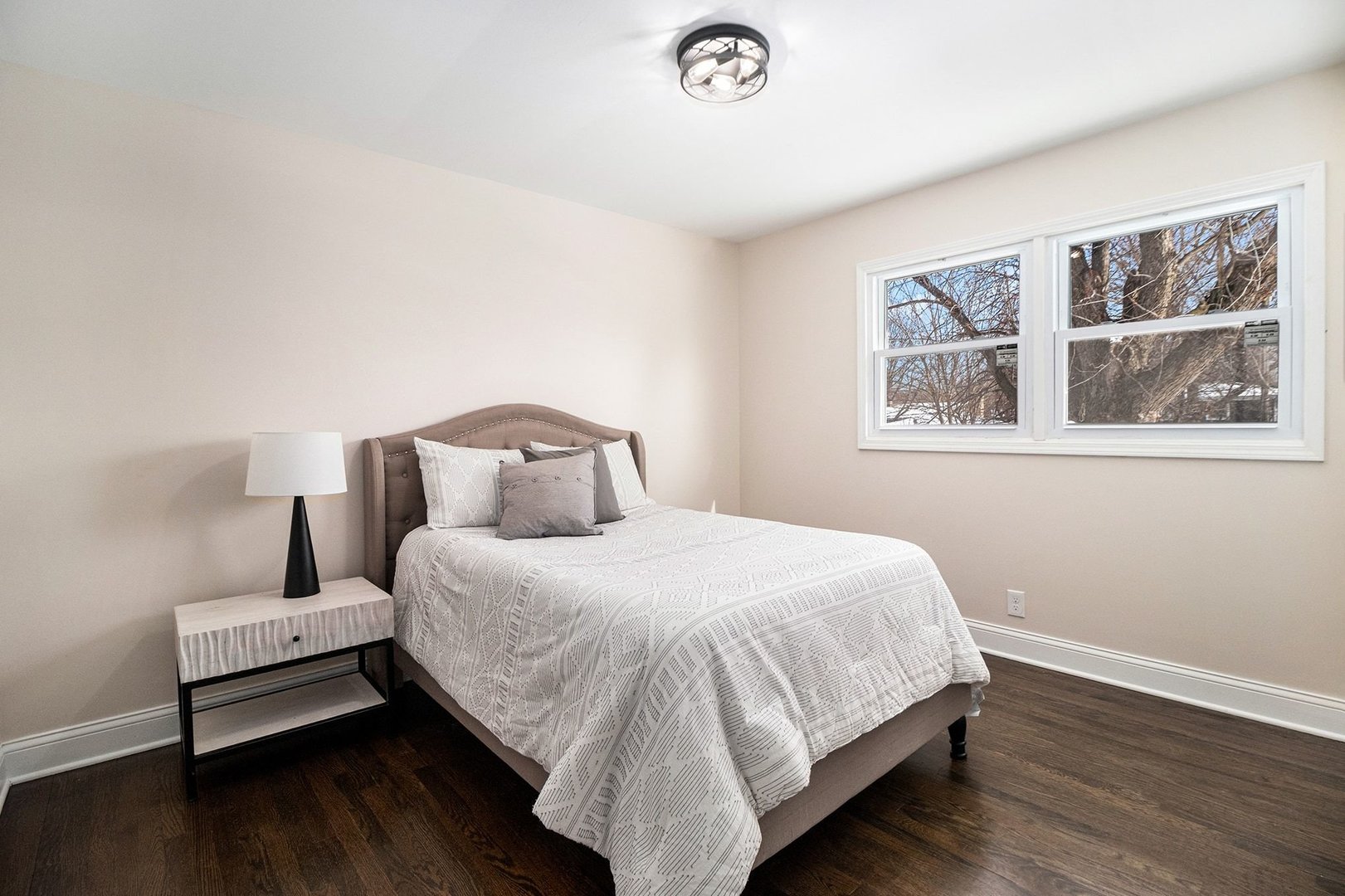 18947 Ridgewood Avenue Lansing, IL 60438 - Photo 12 of 21 a bedroom with a bed and a window