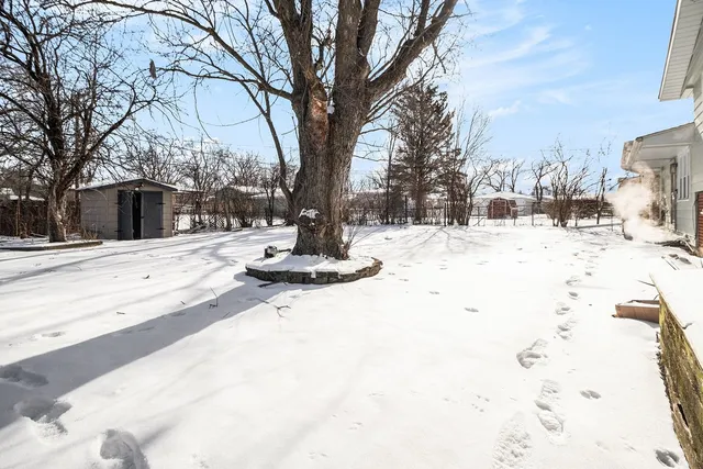 a view of a snow on the side of the road
