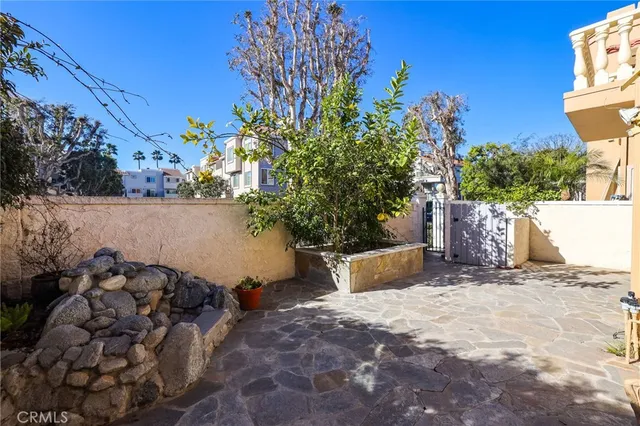 a view of a backyard of the house