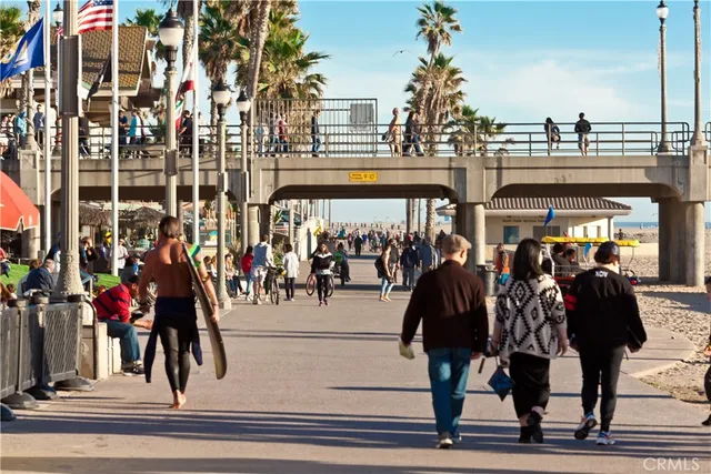 a view of path along with retail shop and buildings