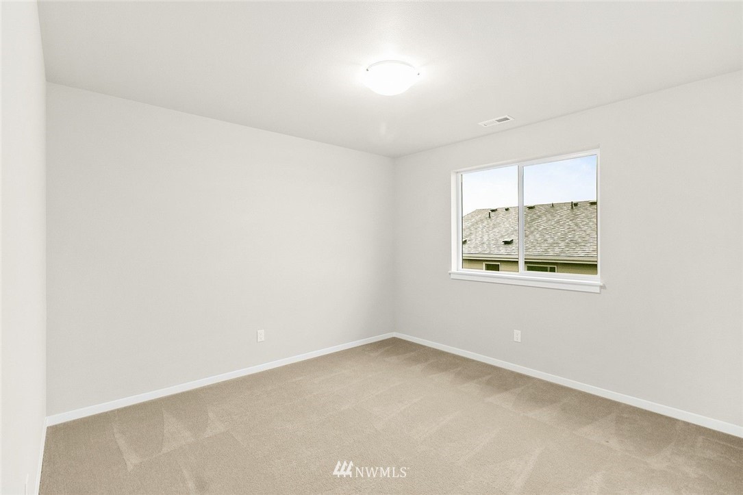 26832 102nd Place Southeast Kent, WA 98030 - Photo 18 of 31 an empty room with a window