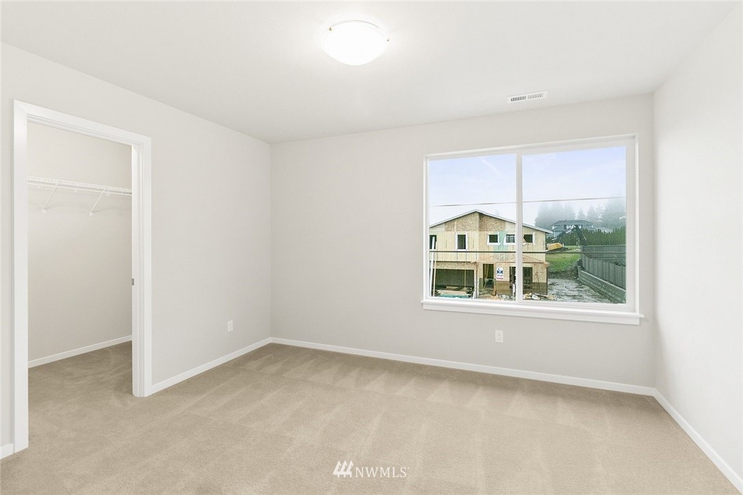 26832 102nd Place Southeast Kent, WA 98030 - Photo 20 of 31 an empty room with a window