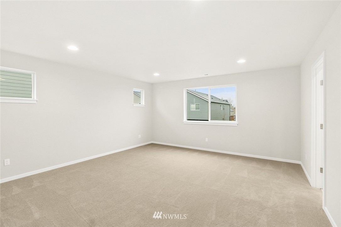 26832 102nd Place Southeast Kent, WA 98030 - Photo 22 of 31 an empty room with a window