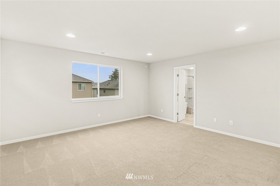 26832 102nd Place Southeast Kent, WA 98030 - Photo 23 of 31 an empty room with a window