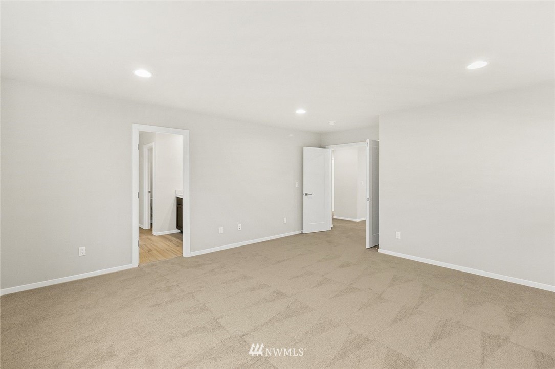 26832 102nd Place Southeast Kent, WA 98030 - Photo 24 of 31 an empty room with an entryway