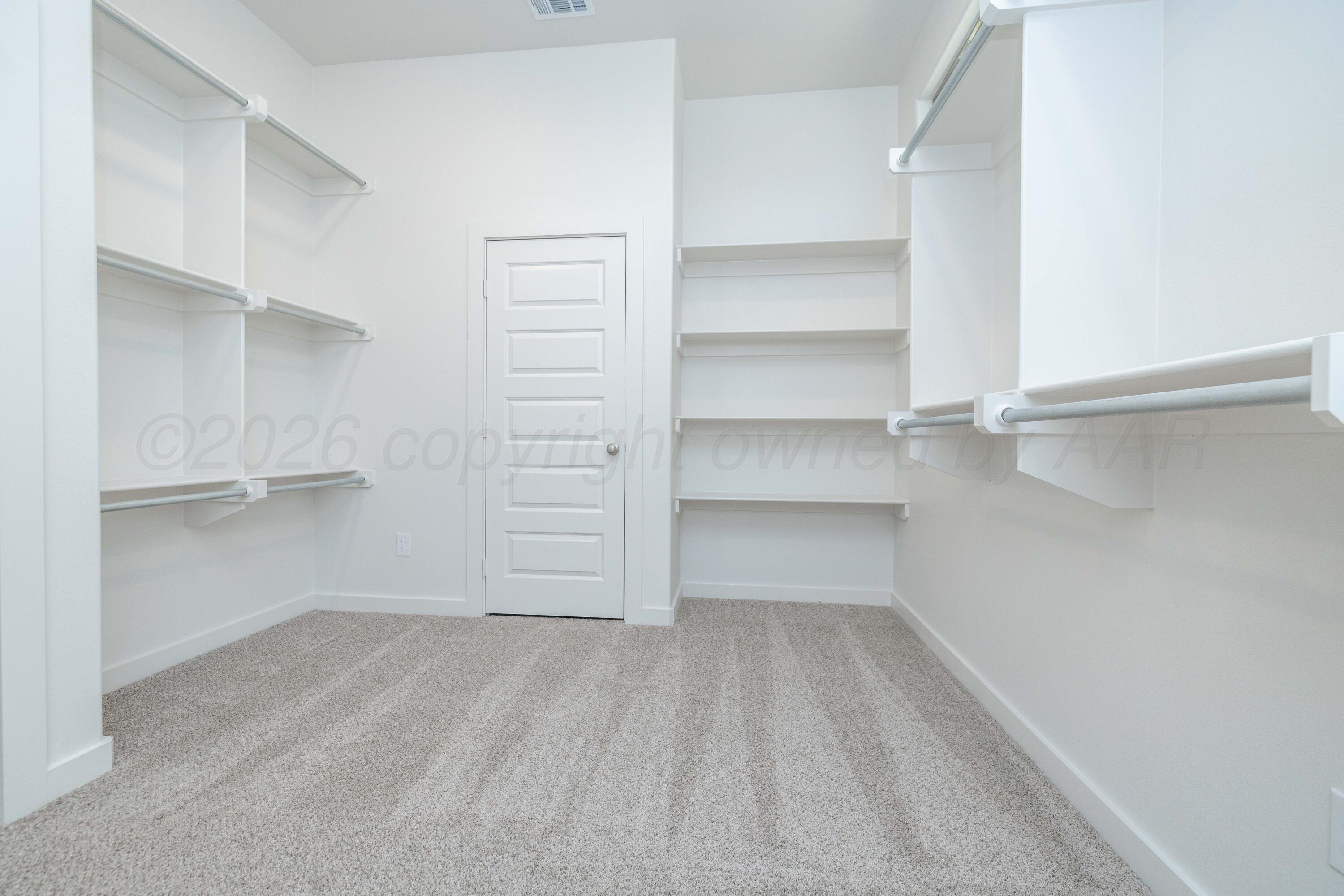 3006 Frontier Lane Amarillo, TX 79124 - Photo 9 of 16 a view of walk in closet with empty racks