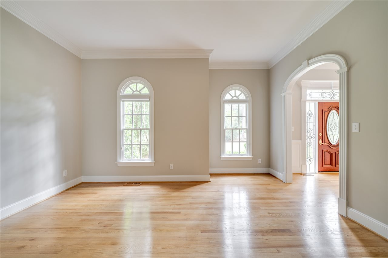 209 Claflin Court Raleigh, NC 27614 - Photo 3 of 30 The entire interior has been painted and this formal living room showcases the gorgeous gray tones found throughout. Living Room