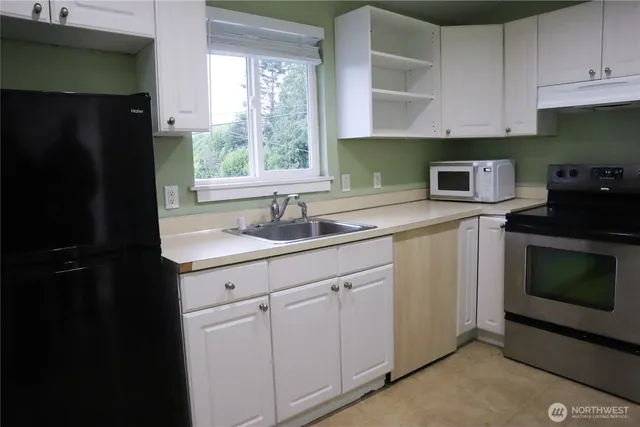 an empty room with wooden floor