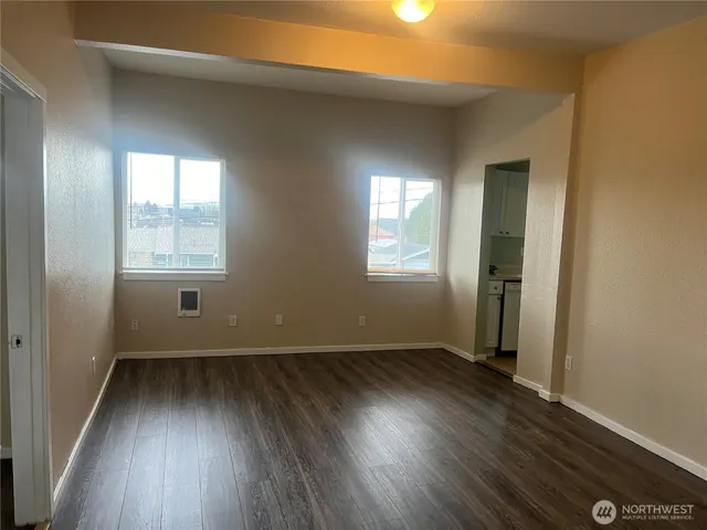 an empty room with windows