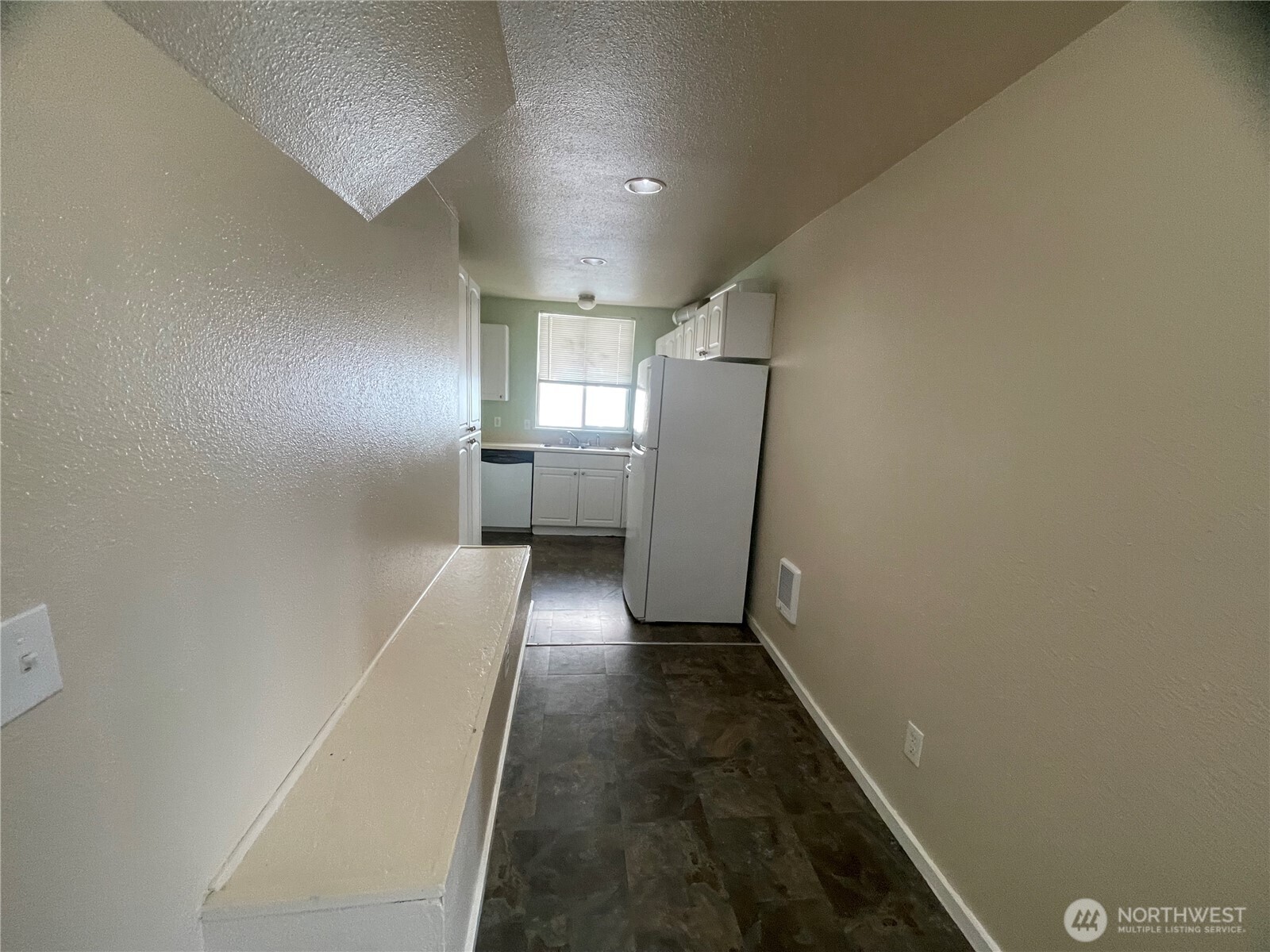 220 West 4th Street Aberdeen, WA 98520 - Photo 17 of 26 a view of hallway with wooden floor