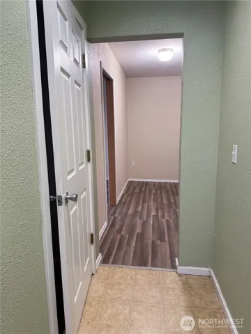 a bathroom with a toilet a sink and bathtub