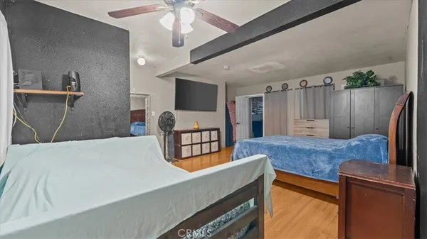 a bathroom with a sink a toilet and shower curtain