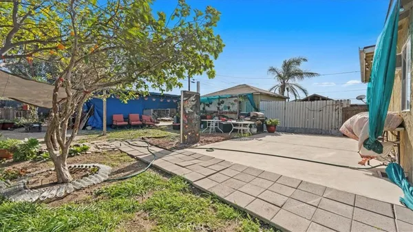 a view of a backyard with a slide