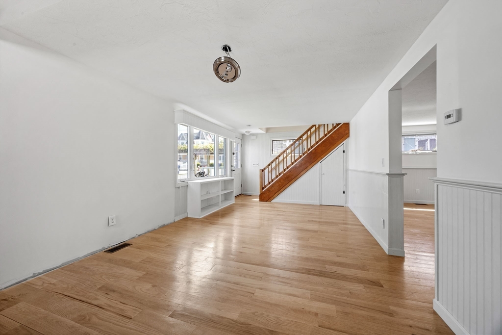 7 Grove Street Wareham, MA 02558 - Photo 14 of 41 a view of empty room with wooden floor and fan