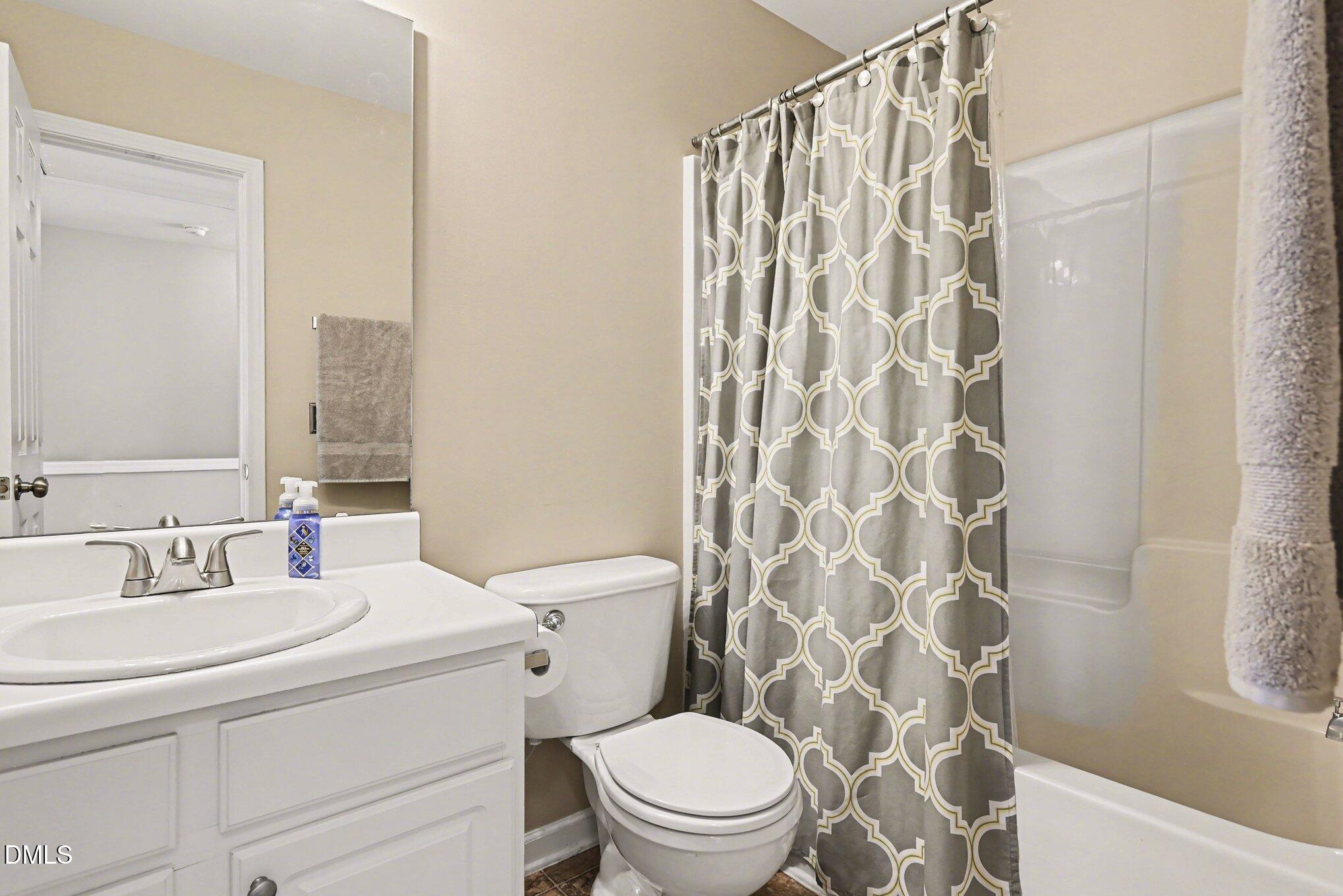 8211 Rhiannon Road Raleigh, NC 27613 - Photo 22 of 25 Full Hall Bath