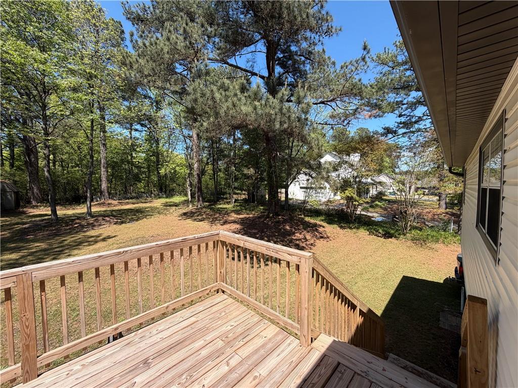 934 Bay Ridge Drive Lawrenceville, GA 30045 - Photo 26 of 78 a view of a balcony with wooden floor