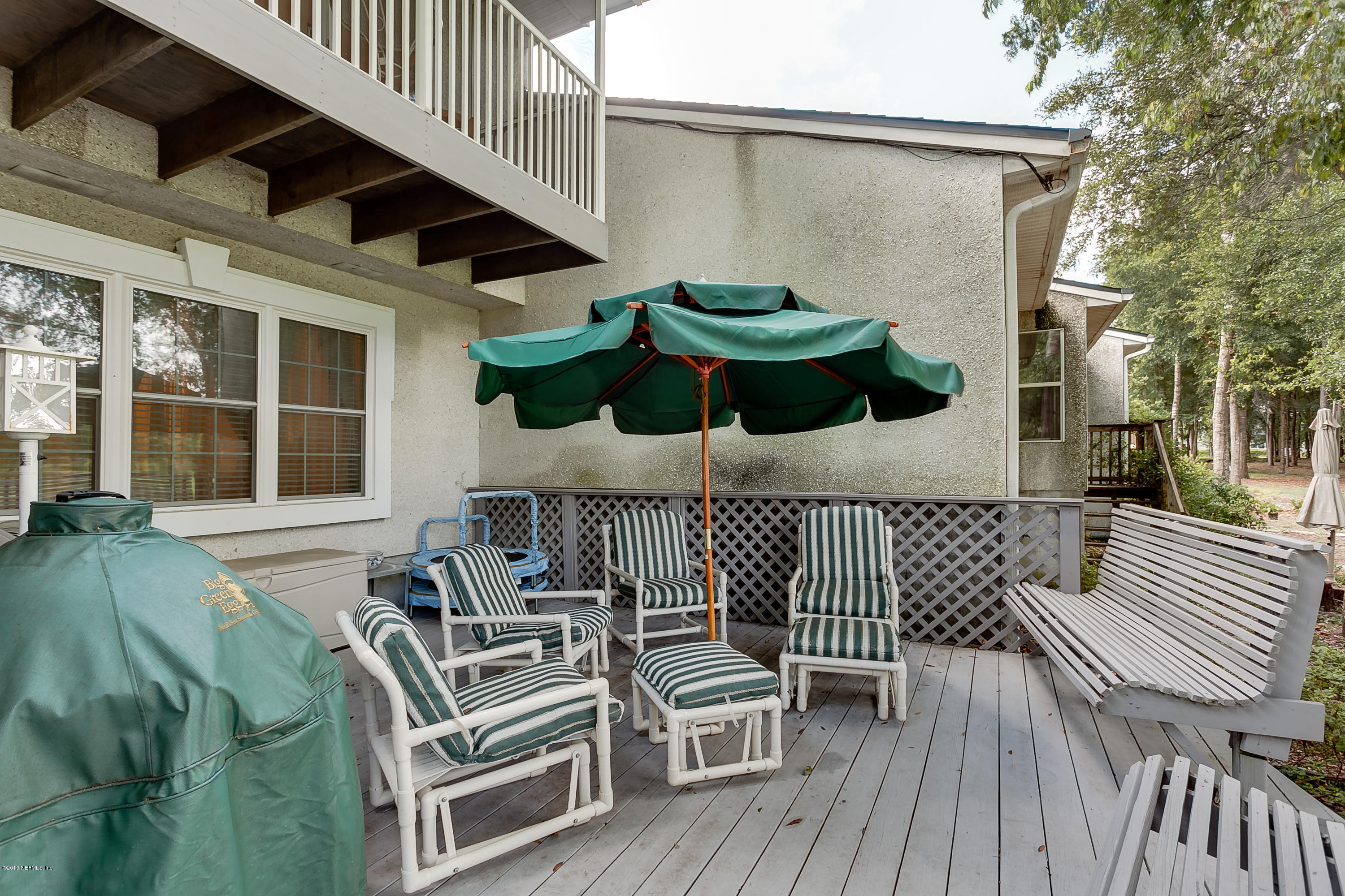 3105 Ravines Road Middleburg, FL 32068 - Photo 11 of 32 a view of deck with patio